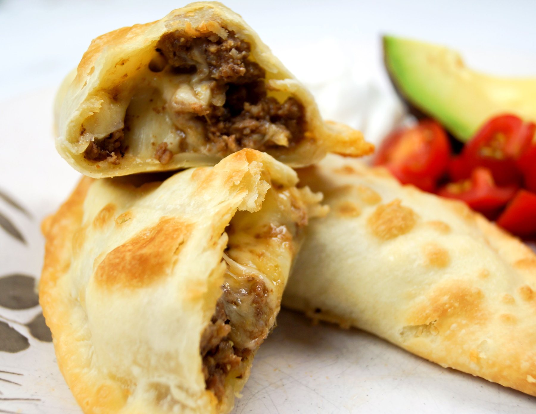 Golden beef empanadas with melted cheese
